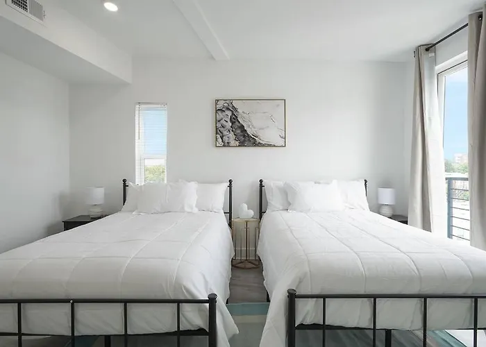 Enjoy City Skyline Views From Private Roofdeck!